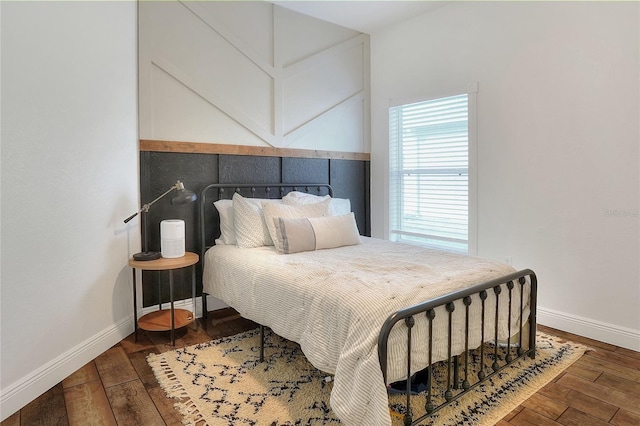 bedroom featuring dark hardwood / wood-style floors