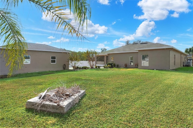 view of yard featuring a fire pit