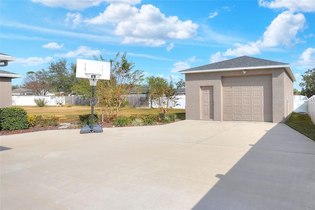 garage featuring a yard