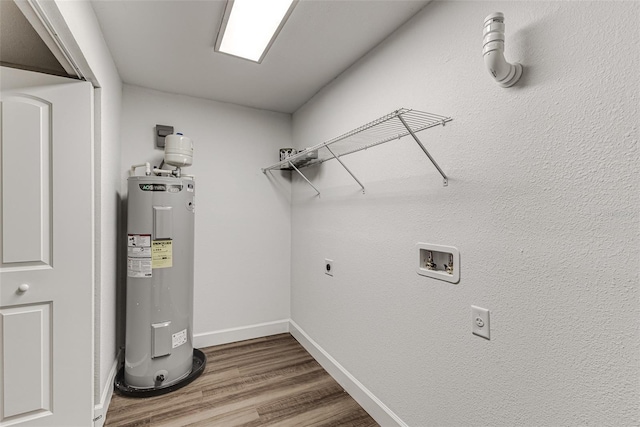 utility room featuring electric water heater