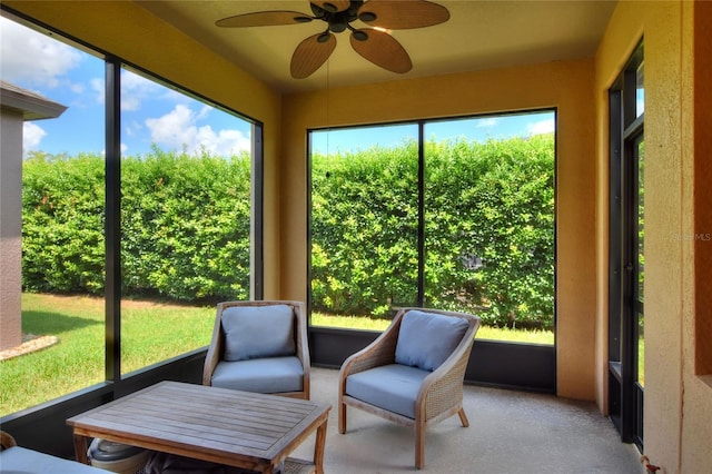 sunroom / solarium with ceiling fan and plenty of natural light