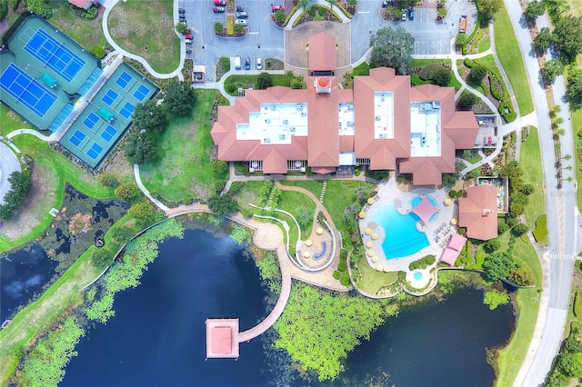 birds eye view of property featuring a water view