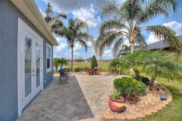 view of patio featuring french doors