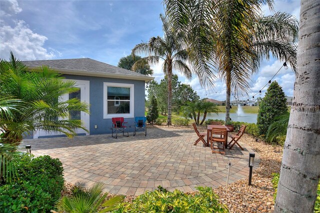 view of patio / terrace with a water view