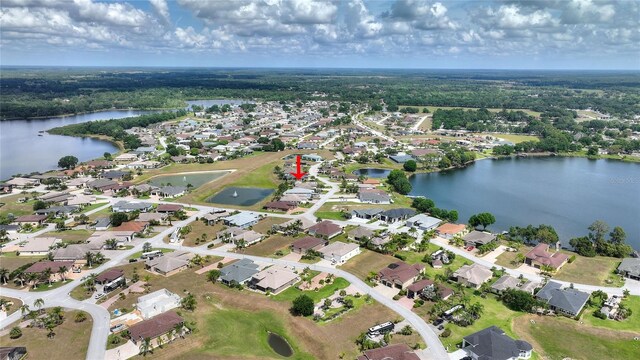 drone / aerial view featuring a water view