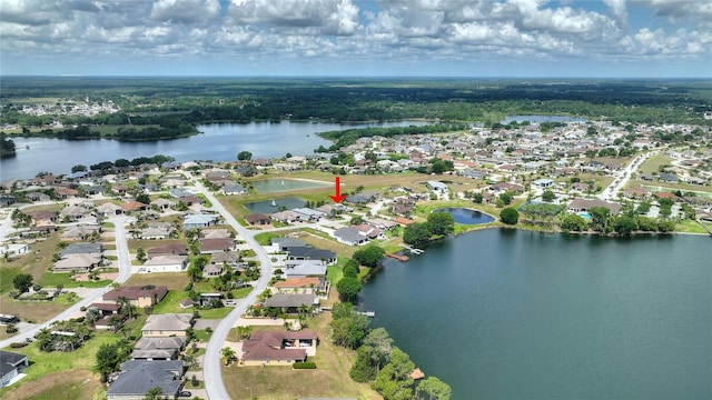 drone / aerial view featuring a water view