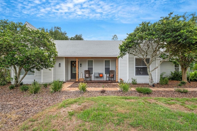 ranch-style house with covered porch