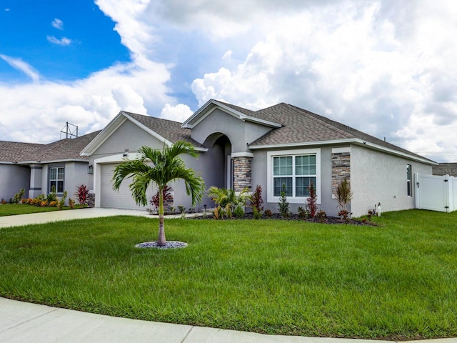 ranch-style house with a garage and a front yard