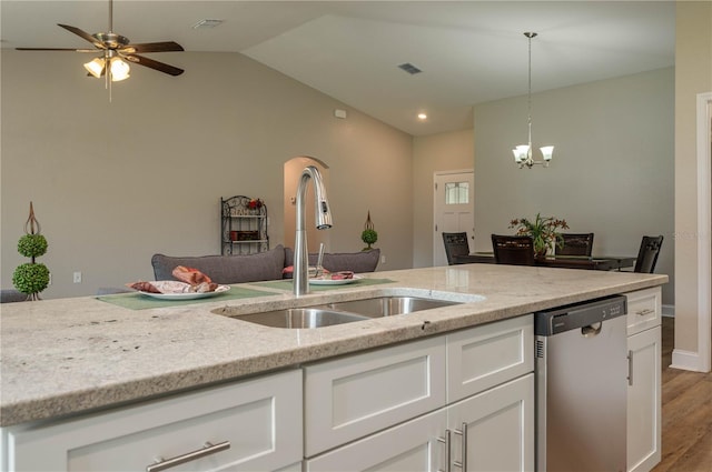 kitchen featuring white cabinetry, sink, light stone countertops, and dishwasher