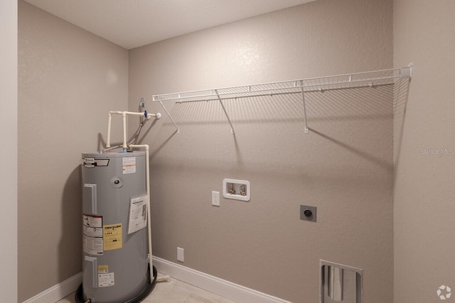 laundry room with hookup for an electric dryer, hookup for a washing machine, light tile patterned flooring, and water heater