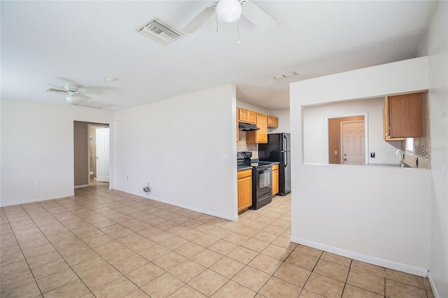 kitchen with black appliances, tasteful backsplash, light tile patterned flooring, and ceiling fan