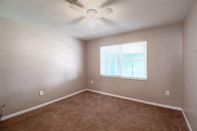 unfurnished room with carpet flooring, ceiling fan, and a textured ceiling