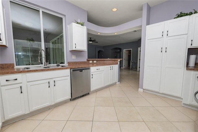 kitchen with white cabinetry, sink, stainless steel dishwasher, and ceiling fan