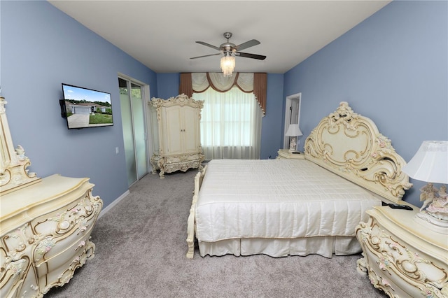 bedroom featuring ceiling fan and carpet floors