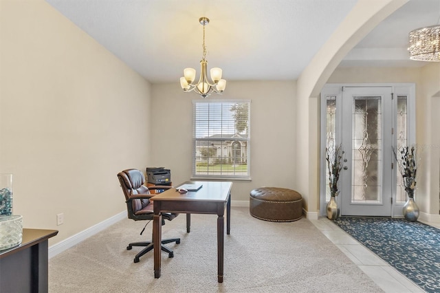 office featuring arched walkways, light tile patterned flooring, a chandelier, and baseboards