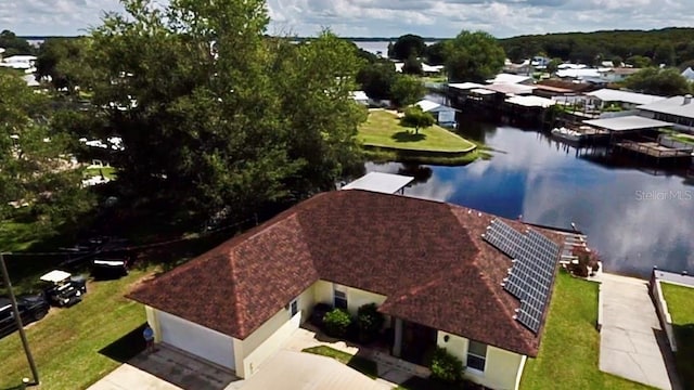 drone / aerial view with a water view