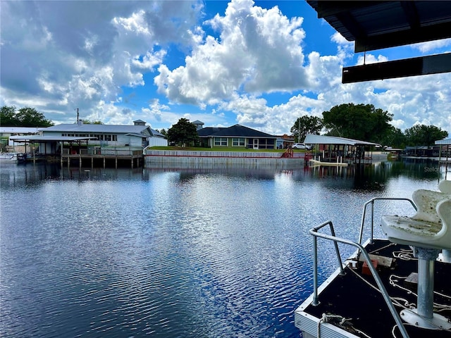 view of water feature with a dock