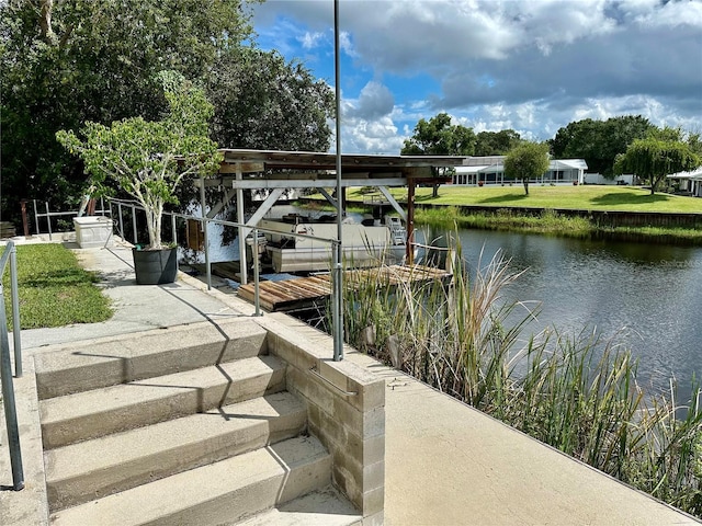 dock area featuring a water view