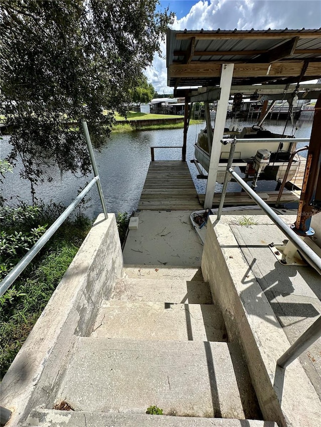 dock area featuring a water view