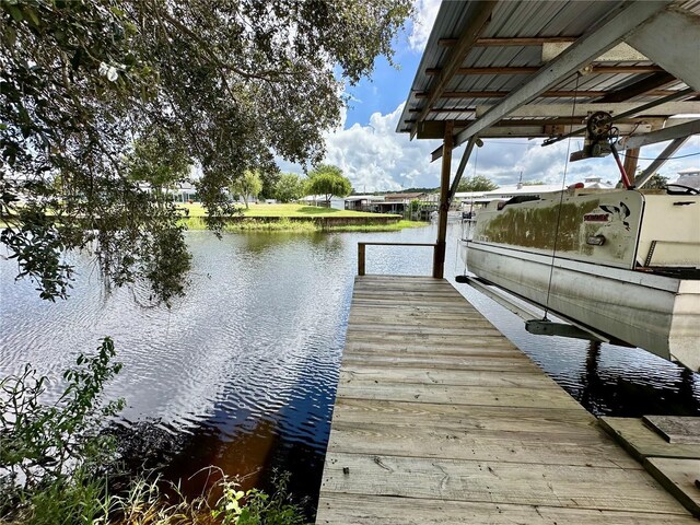 dock area featuring a water view