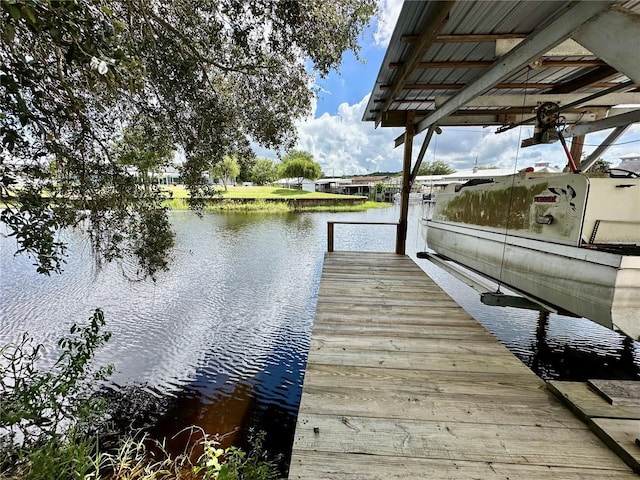 dock area featuring a water view