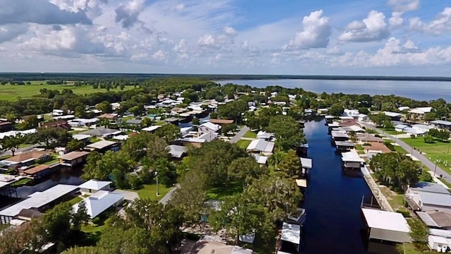 aerial view with a water view and a residential view