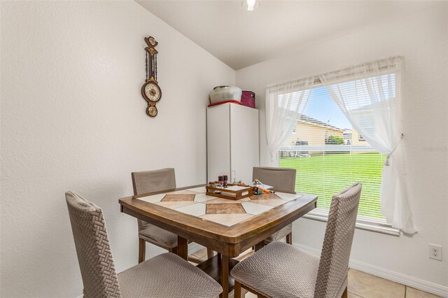 dining room featuring light tile patterned flooring