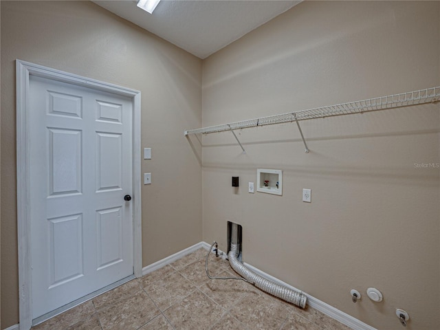 laundry area with washer hookup, gas dryer hookup, light tile patterned floors, and hookup for an electric dryer