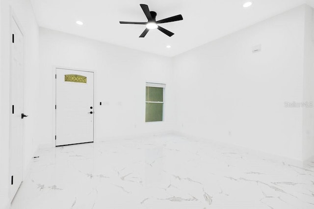 unfurnished room featuring ceiling fan