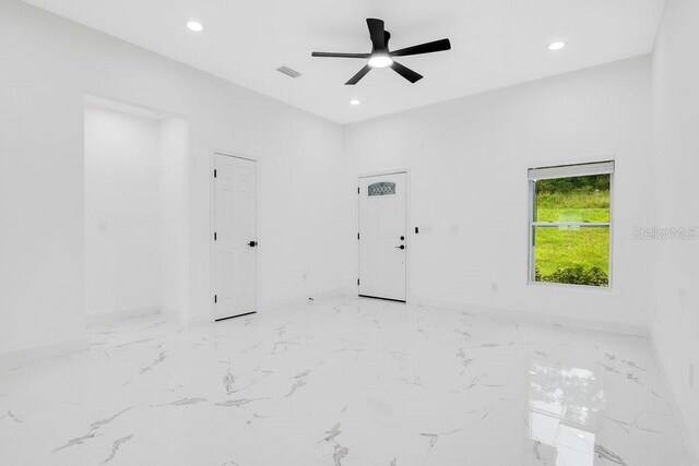 empty room featuring ceiling fan