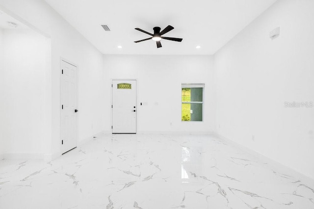 unfurnished room featuring ceiling fan