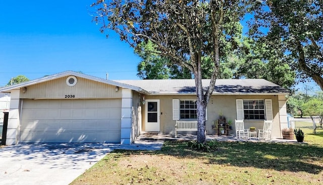 ranch-style house with a front yard and a garage