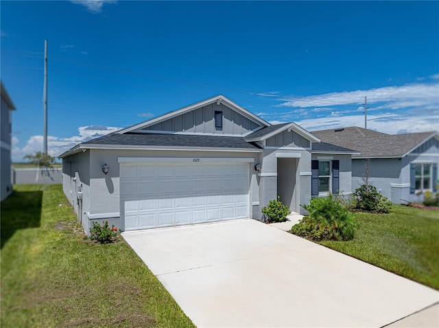 single story home with a front lawn and a garage