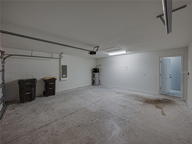 garage featuring electric panel, hybrid water heater, and a garage door opener