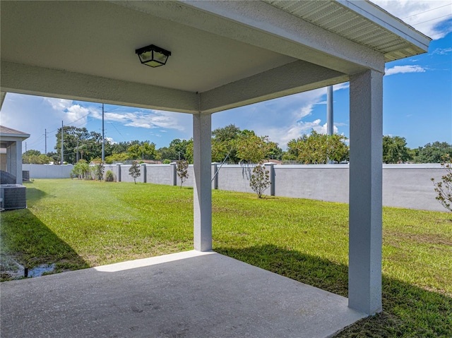 1029 Mattie Pointe Way, Auburndale, FL 33823 - view of yard featuring a fenced backyard, central AC unit, and a patio area
