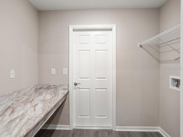 laundry area with hookup for a washing machine and dark hardwood / wood-style floors