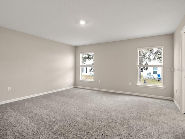 view of carpeted spare room