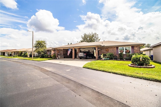 single story home featuring a front yard