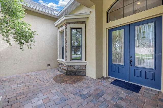 entrance to property with french doors