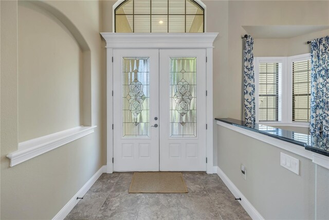 entrance foyer featuring french doors