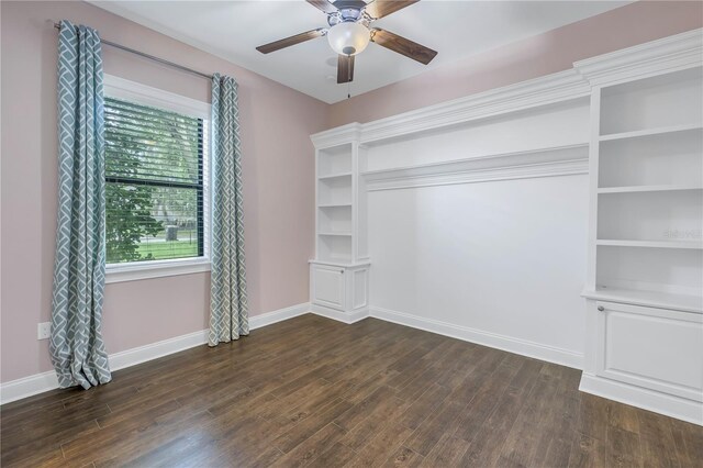 interior space featuring ceiling fan and dark wood-type flooring