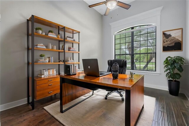 office space with ceiling fan and dark wood-type flooring