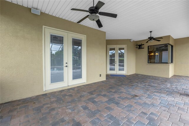 view of patio featuring french doors and ceiling fan