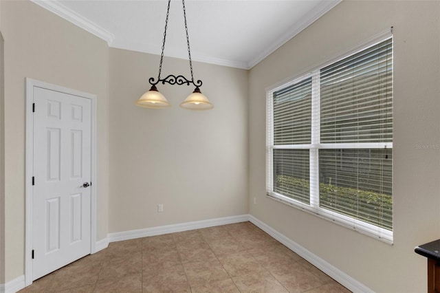 tiled spare room featuring crown molding