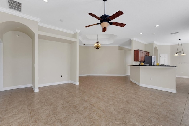 unfurnished living room with ceiling fan and crown molding