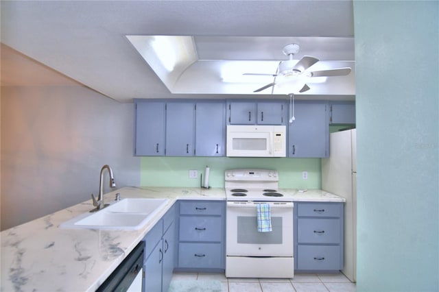 kitchen featuring white appliances, ceiling fan, light tile patterned floors, and sink