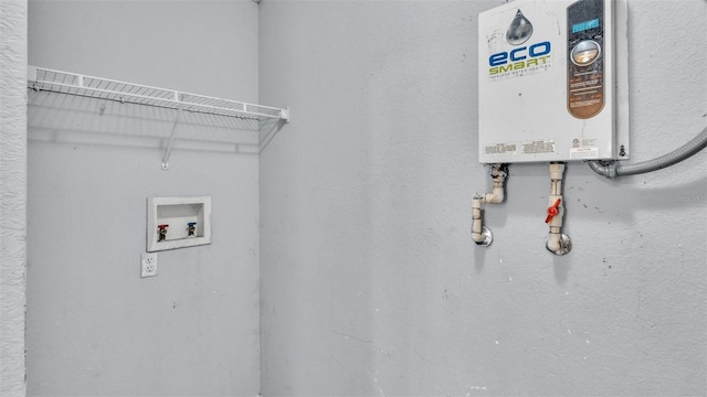 laundry area featuring washer hookup and water heater