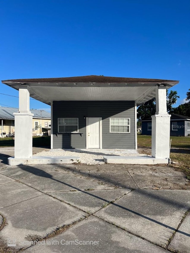 view of car parking featuring a carport