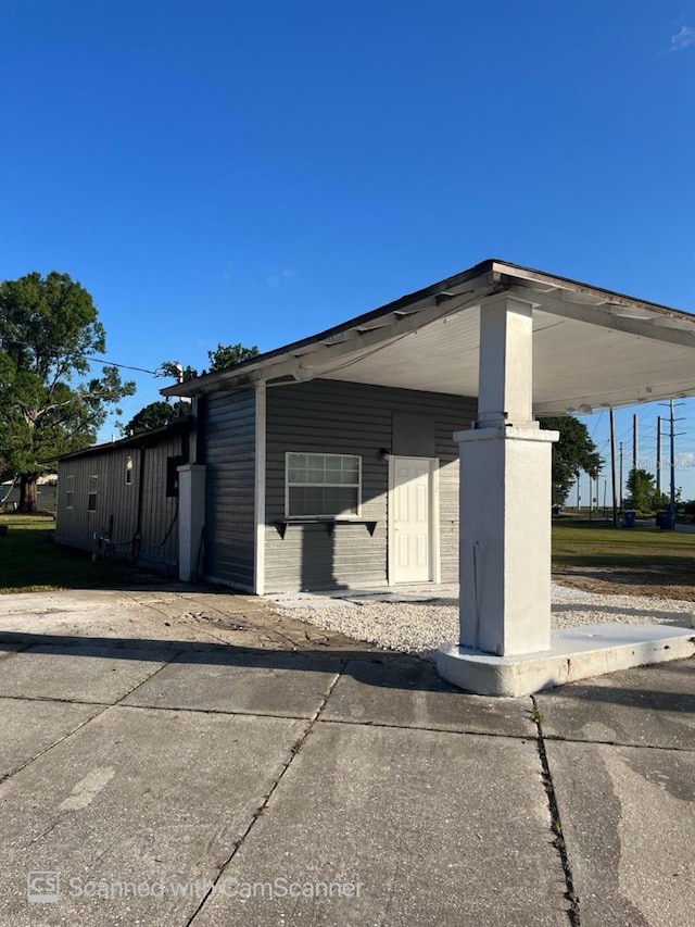 exterior space featuring a carport