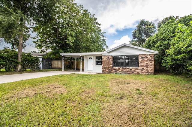 ranch-style house with a front lawn and a carport